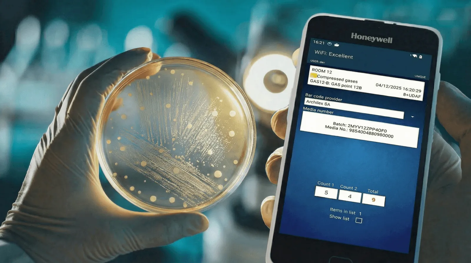 The BioTrends EM Mobile reading screen beside a plate: the two counts and their total, against the sampled point